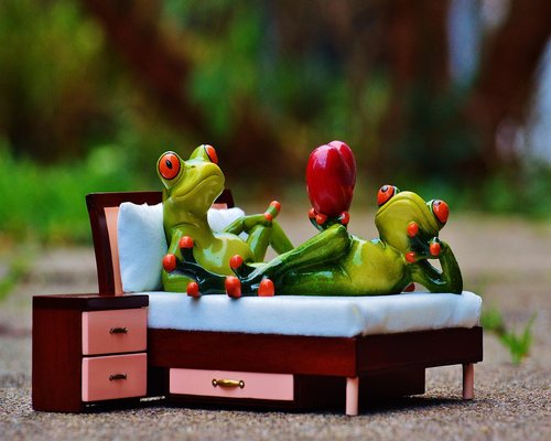 White noise machine on a bedside table